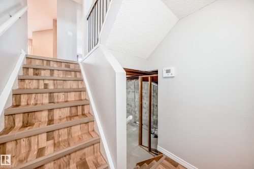 Stairs from Main Floor down to garage - 14934 43 Avenue, Edmonton, AB - Indoor Photo Showing Other Room