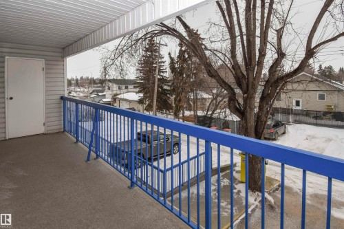 South-facing balcony has a storage room at each end - 102 4812 51 Avenue, Stony Plain, AB - Outdoor With Balcony With Exterior