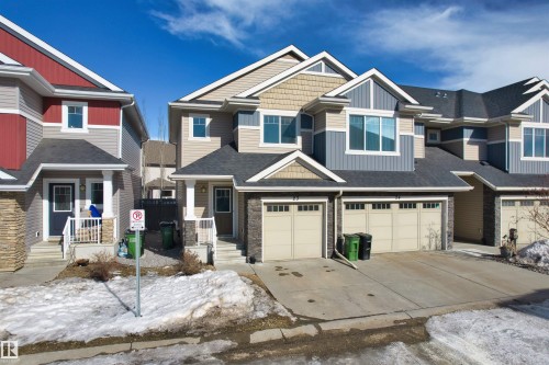 23 2004 Trumpeter Way, Edmonton, AB - Outdoor With Facade