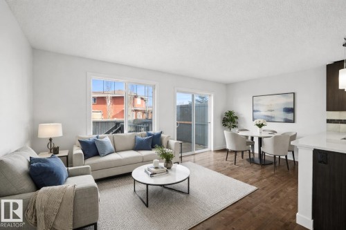 23 2004 Trumpeter Way, Edmonton, AB - Indoor Photo Showing Living Room