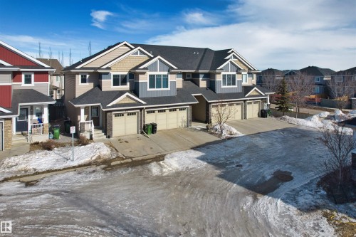 23 2004 Trumpeter Way, Edmonton, AB - Outdoor With Facade