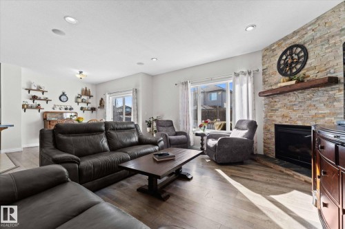 16 Silverstone Drive, Stony Plain, AB - Indoor Photo Showing Living Room With Fireplace