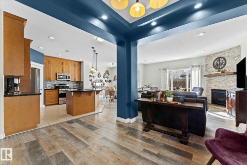 16 Silverstone Drive, Stony Plain, AB - Indoor Photo Showing Other Room With Fireplace