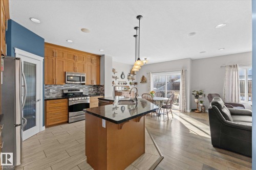 16 Silverstone Drive, Stony Plain, AB - Indoor Photo Showing Kitchen With Double Sink With Upgraded Kitchen