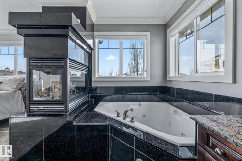 727 107A Street, Edmonton, AB - Indoor Photo Showing Bathroom With Fireplace