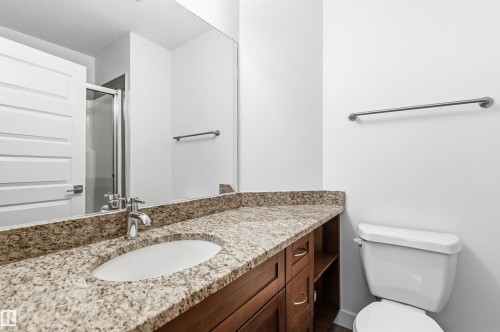 Full bathroom with vanity and a stall shower - 106 1238 Windermere Way, Edmonton, AB - Indoor Photo Showing Bathroom
