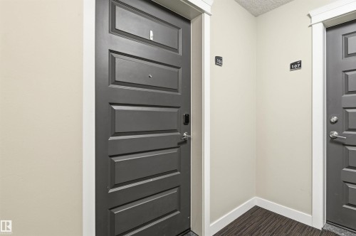 Doorway to property - 106 1238 Windermere Way, Edmonton, AB - Indoor Photo Showing Other Room