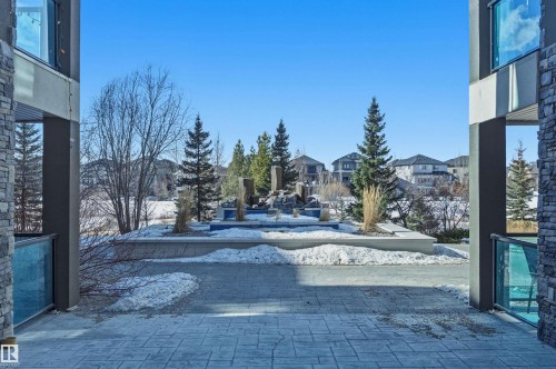 View of decorative road featuring a residential view - 106 1238 Windermere Way, Edmonton, AB - Outdoor