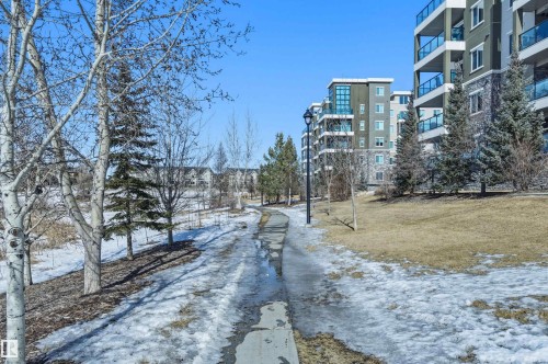 View of street featuring street lighting - 106 1238 Windermere Way, Edmonton, AB - Outdoor With Balcony