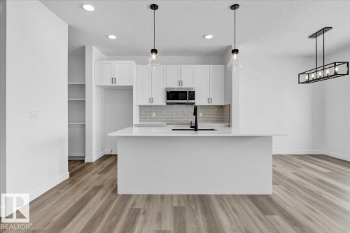 61 Sumac Close, Fort Saskatchewan, AB - Indoor Photo Showing Kitchen With Upgraded Kitchen