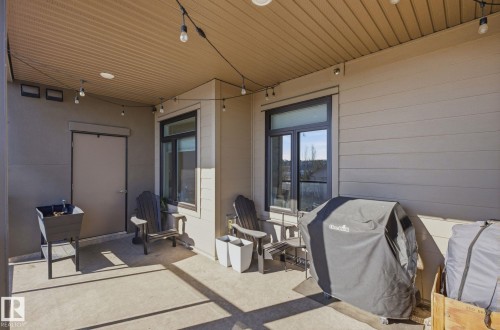 View of patio with grilling area - 309 625 Leger Way, Edmonton, AB - Outdoor With Deck Patio Veranda With Exterior