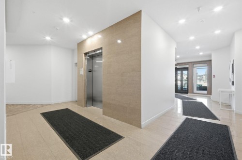 Lobby featuring recessed lighting - 309 625 Leger Way, Edmonton, AB - Indoor Photo Showing Other Room