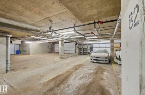 View of parking garage - 309 625 Leger Way, Edmonton, AB - Indoor Photo Showing Garage