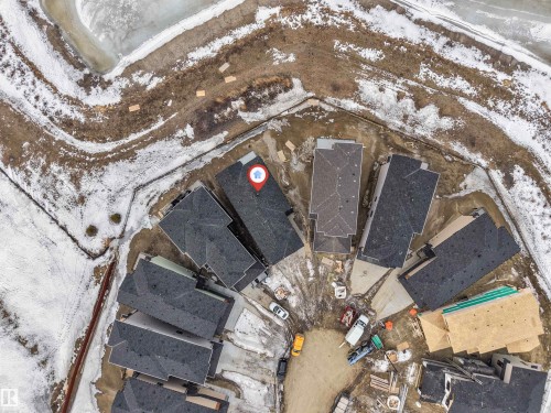 Snowy aerial view featuring a residential view - 13 Trill Point(E), Spruce Grove, AB - Outdoor