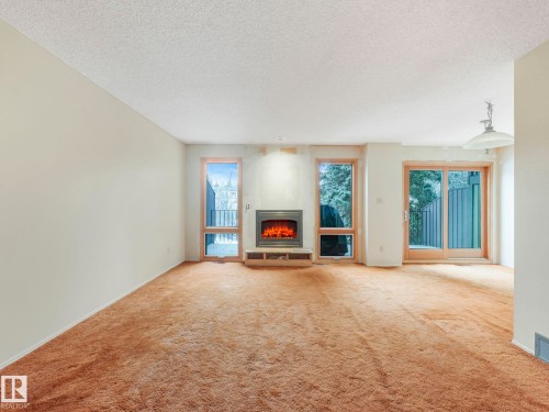 185 Hearthstone, Edmonton, AB - Indoor Photo Showing Living Room With Fireplace