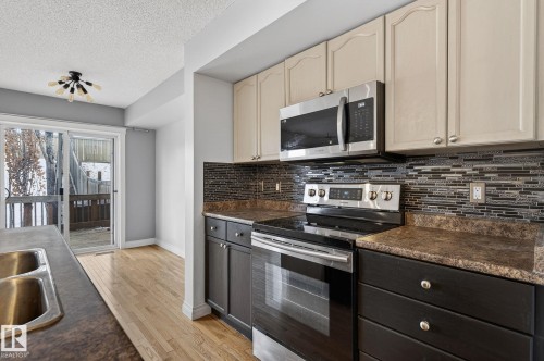 95 Hartwick Loop, Spruce Grove, AB - Indoor Photo Showing Kitchen With Double Sink