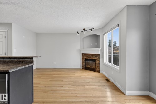 95 Hartwick Loop, Spruce Grove, AB - Indoor Photo Showing Living Room With Fireplace