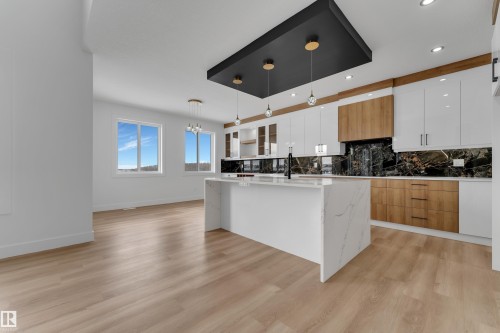 144 Edgewater Circle, Leduc, AB - Indoor Photo Showing Kitchen With Upgraded Kitchen