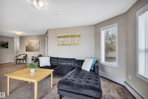 215 392 Silver Berry Road, Edmonton, AB - Indoor Photo Showing Living Room