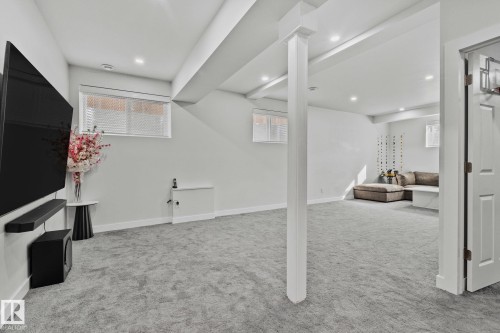 Basement with light colored carpet and recessed lighting - 1611 158 Street, Edmonton, AB - Indoor
