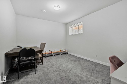Office area featuring baseboards and light colored carpet - 1611 158 Street, Edmonton, AB - Indoor Photo Showing Other Room