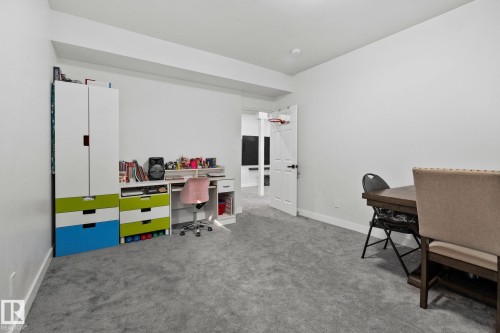 Office featuring light carpet and baseboards - 1611 158 Street, Edmonton, AB - Indoor Photo Showing Office