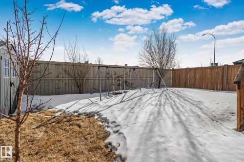 Yard covered in snow featuring a fenced backyard - 1611 158 Street, Edmonton, AB - Outdoor
