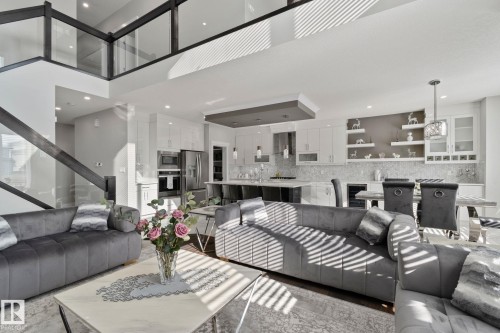 Living area featuring beverage cooler - 1611 158 Street, Edmonton, AB - Indoor Photo Showing Living Room
