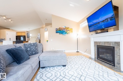 8390 Shaske Crescent, Edmonton, AB - Indoor Photo Showing Living Room With Fireplace