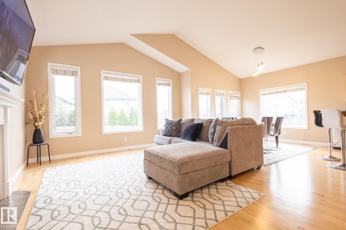8390 Shaske Crescent, Edmonton, AB - Indoor Photo Showing Living Room With Fireplace