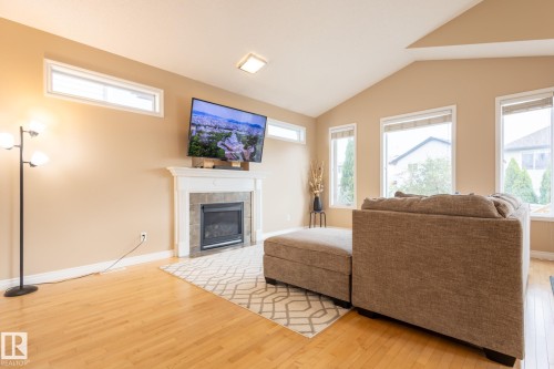 8390 Shaske Crescent, Edmonton, AB - Indoor Photo Showing Living Room With Fireplace