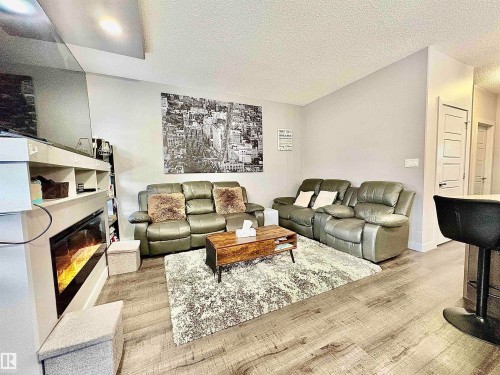 14 Hickory Road, Fort Saskatchewan, AB - Indoor Photo Showing Living Room With Fireplace