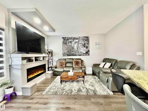 14 Hickory Road, Fort Saskatchewan, AB - Indoor Photo Showing Living Room With Fireplace
