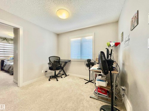 14 Hickory Road, Fort Saskatchewan, AB - Indoor Photo Showing Gym Room