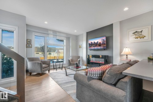 173 Hays Ridge Boulevard, Edmonton, AB - Indoor Photo Showing Living Room With Fireplace