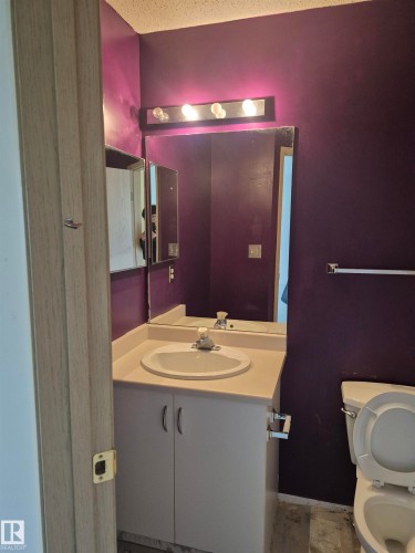 Bathroom with vanity and toilet - 410 17467 98A Avenue, Edmonton, AB - Indoor Photo Showing Bathroom