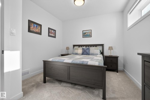 Bedroom with light colored carpet - 9727 205 Street, Edmonton, AB - Indoor Photo Showing Bedroom