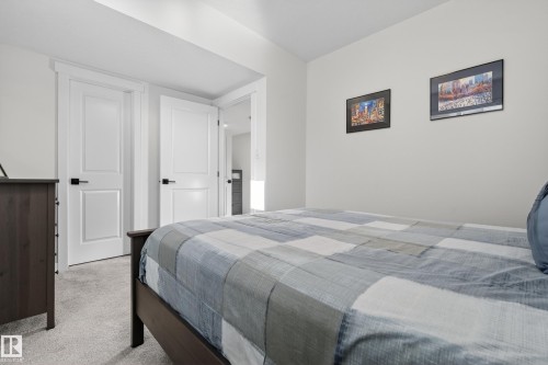 Bedroom featuring light colored carpet - 9727 205 Street, Edmonton, AB - Indoor Photo Showing Bedroom