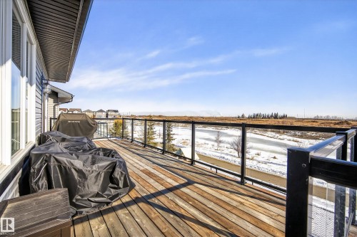 Snow covered deck featuring grilling area - 9727 205 Street, Edmonton, AB - Outdoor With Exterior