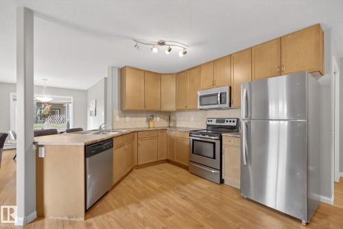 120 1204 156 Street, Edmonton, AB - Indoor Photo Showing Kitchen With Double Sink