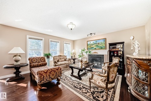 3711 163 Avenue, Edmonton, AB - Indoor Photo Showing Living Room With Fireplace