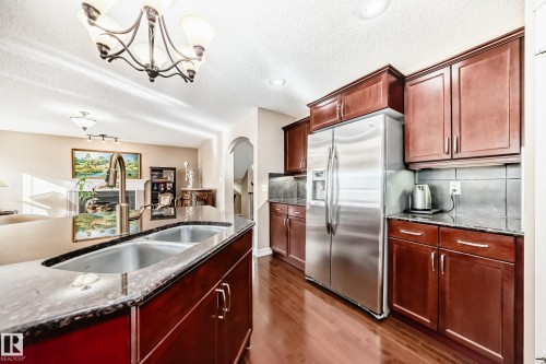 3711 163 Avenue, Edmonton, AB - Indoor Photo Showing Kitchen With Double Sink
