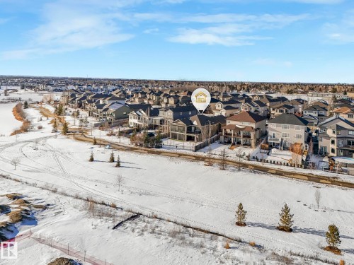 Snowy aerial view with a residential view - 117 Mcdowell Wynd, Leduc, AB - Outdoor With View