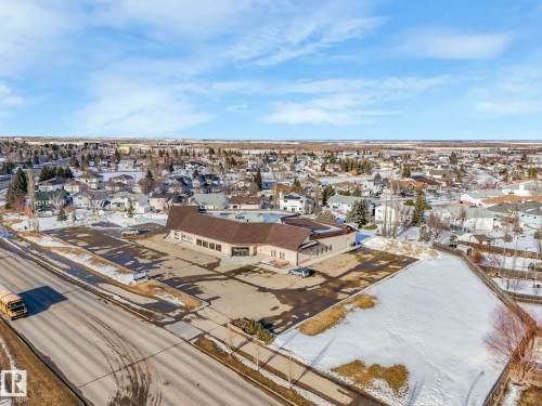 Snowy aerial view with a residential view - 117 Mcdowell Wynd, Leduc, AB - Outdoor With View