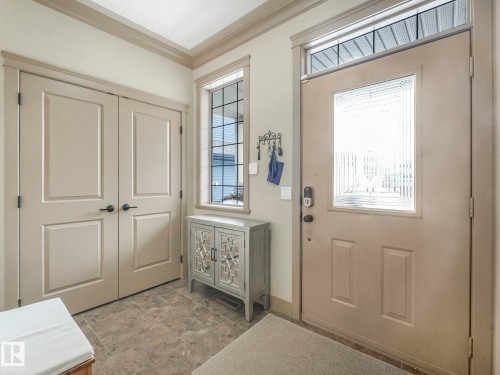 Entryway featuring crown molding - 117 Mcdowell Wynd, Leduc, AB - Indoor Photo Showing Other Room