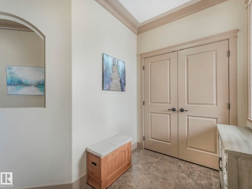 Mudroom with crown molding and baseboards - 117 Mcdowell Wynd, Leduc, AB - Indoor Photo Showing Other Room