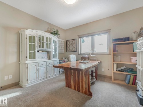 Office area featuring plenty of natural light and light carpet - 117 Mcdowell Wynd, Leduc, AB - Indoor Photo Showing Office