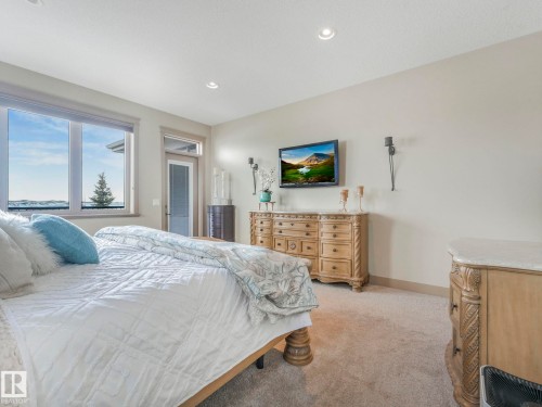 Bedroom with light carpet and recessed lighting - 117 Mcdowell Wynd, Leduc, AB - Indoor Photo Showing Bedroom
