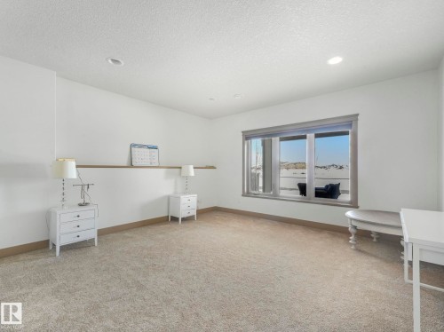 Office featuring light carpet and a textured ceiling - 117 Mcdowell Wynd, Leduc, AB - Indoor
