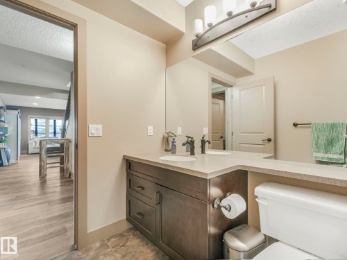 Bathroom featuring vanity and a textured ceiling - 117 Mcdowell Wynd, Leduc, AB - Indoor Photo Showing Bathroom